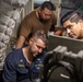 USS Spruance conducts seawater condenser maintenance
