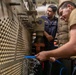 USS Spruance conducts seawater condenser maintenance