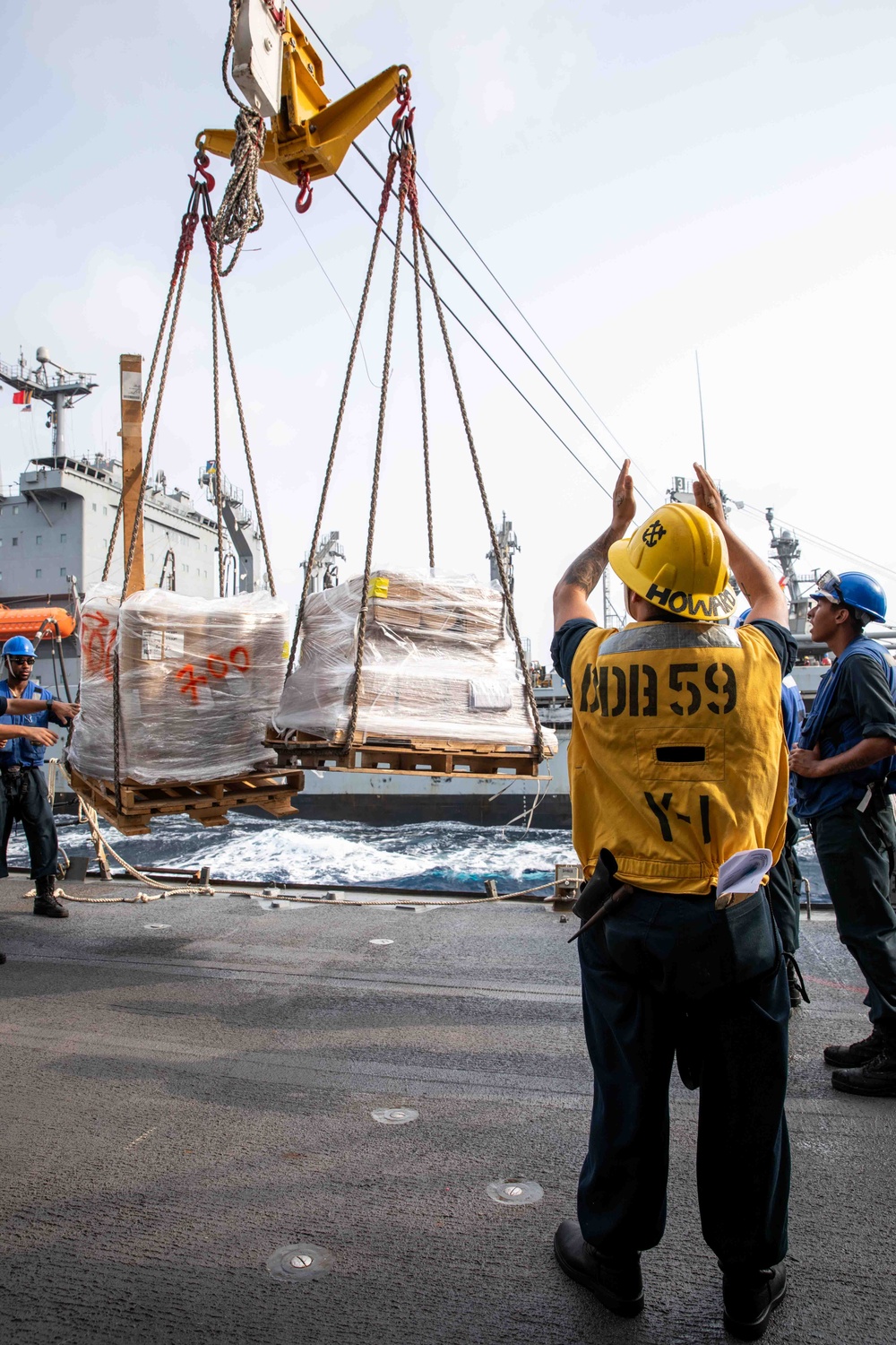USS Russell Conducts a Replenishment-At-Sea with USNS Big Horn