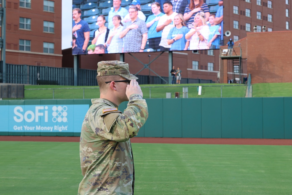 Soldier salutes during national anthem