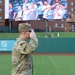 Soldier salutes during national anthem