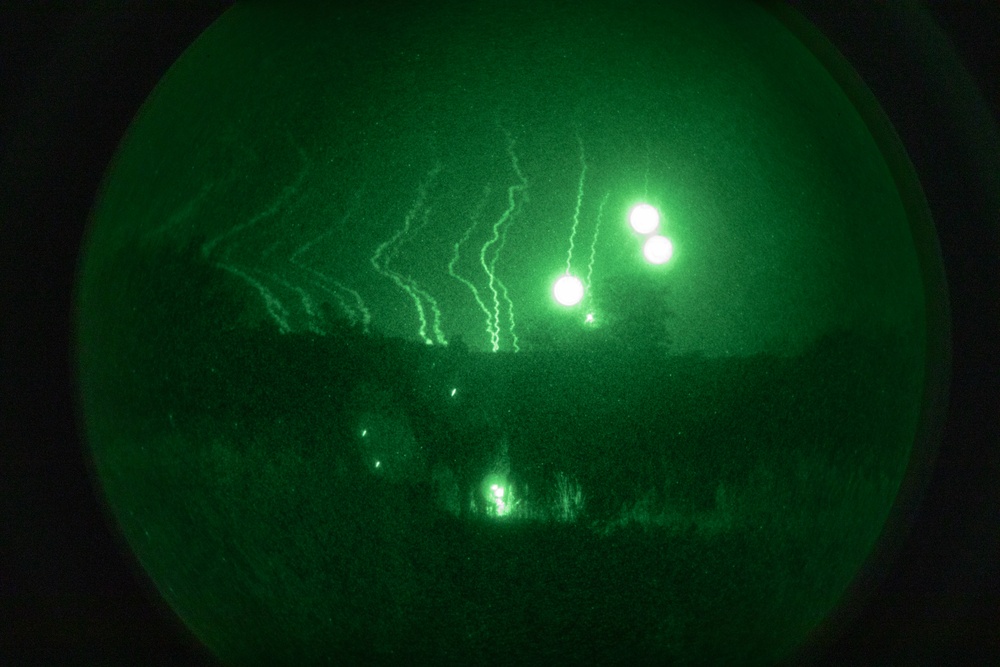 B Battery, 1st Battalion, 201st Field Artillery Regiment reacts to contact and shoots illumination rounds during Northern Strike 2024