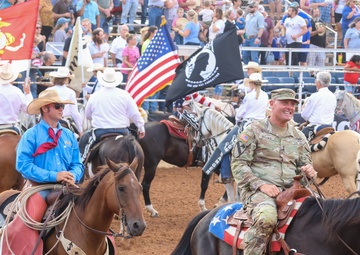 FCOE CG rides in rodeo grand entry