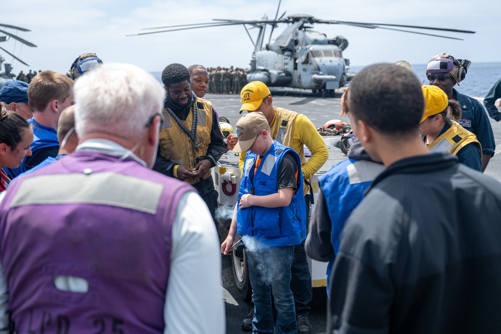 Family members embark USS Somerset for Tiger Cruise