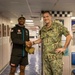 Port Adelaide Football Team members tour submarine tender USS Emory S. Land (AS 39)