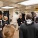 Port Adelaide Football Team members tour submarine tender USS Emory S. Land (AS 39)