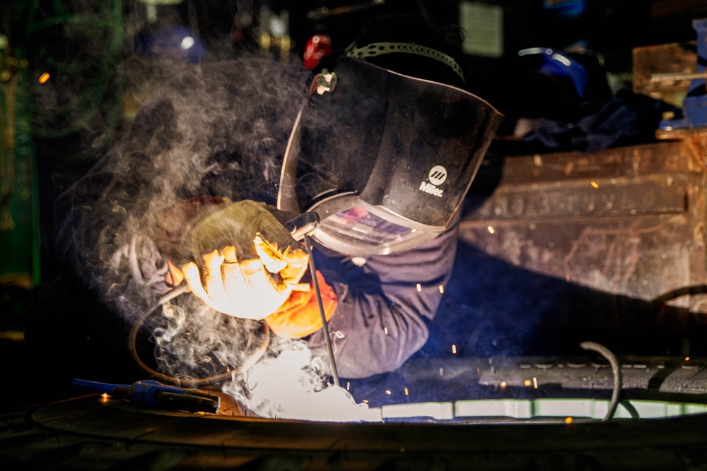 Marine Metal Worker Conducts Maintenance Underway