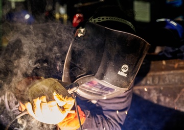 Marine Metal Worker Conducts Maintenance Underway