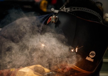 Marine Metal Worker Conducts Maintenance Underway