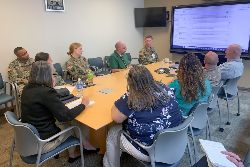 DHA Admiral Visits BACH