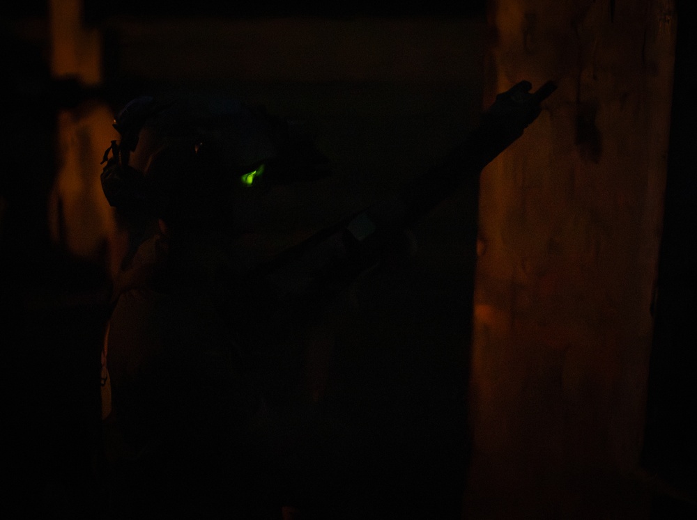 Alabama National Guard Special Forces Soldiers sharpen their senses during night fire training