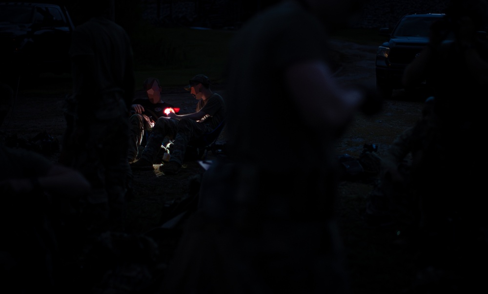 Alabama National Guard Special Forces Soldiers sharpen their senses during night fire training