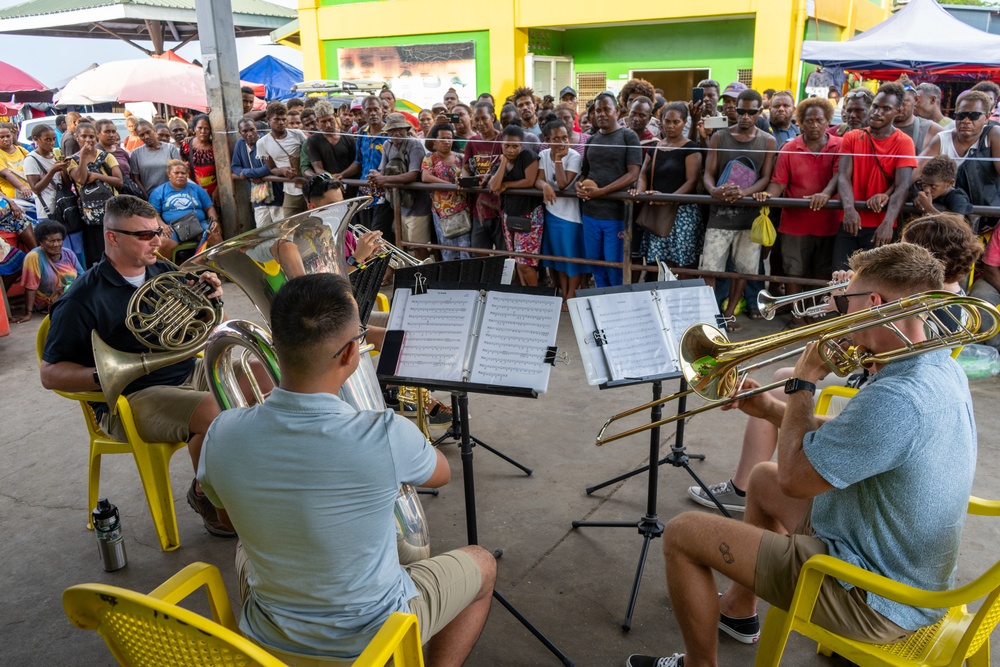 MARFORPAC band performs at Central Market in Guadalcanal