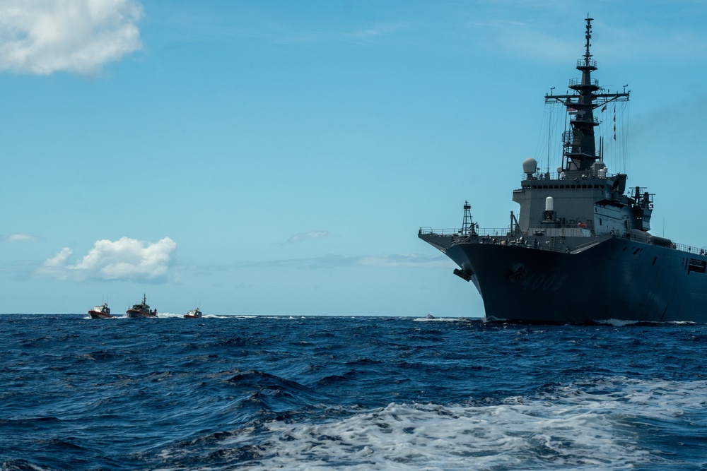 U.S. Coast Guard escorts JS Kunisaki into Pearl Harbor, Hawai'i