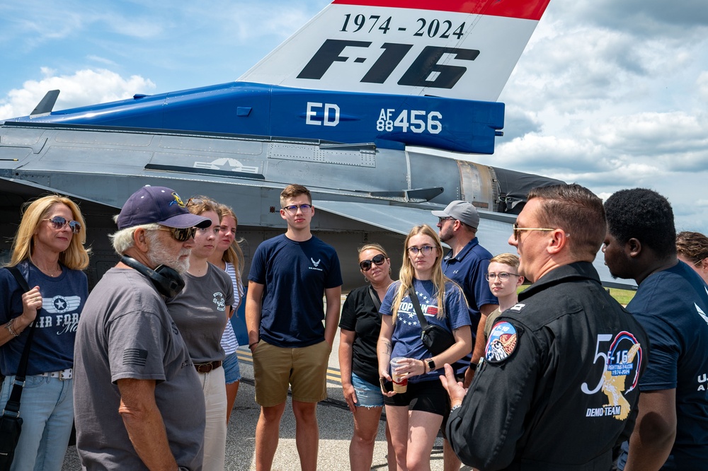 The U.S. Air Force F-16 Viper Demonstration Team interacts with the local community at the Thunder Over Michigan Air Show