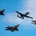 The U.S. Air Force Air Combat Command demonstration teams perform a four-ship heritage flight at EAA AirVenture Oshkosh