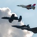 The U.S. Air Force Air Combat Command demonstration teams perform a four-ship heritage flight at EAA AirVenture Oshkosh