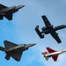 The U.S. Air Force Air Combat Command demonstration teams perform a four-ship heritage flight at EAA AirVenture Oshkosh