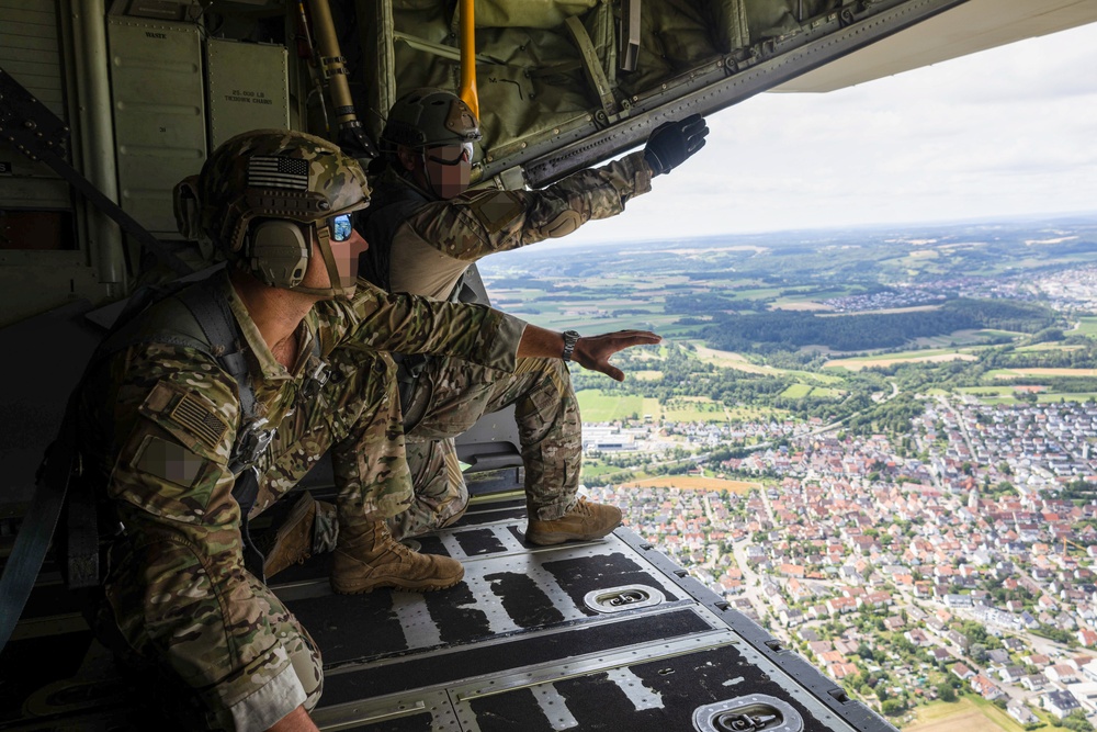 U.S. Army Green Berets perform air drop training with U.S. Air Force Airmen