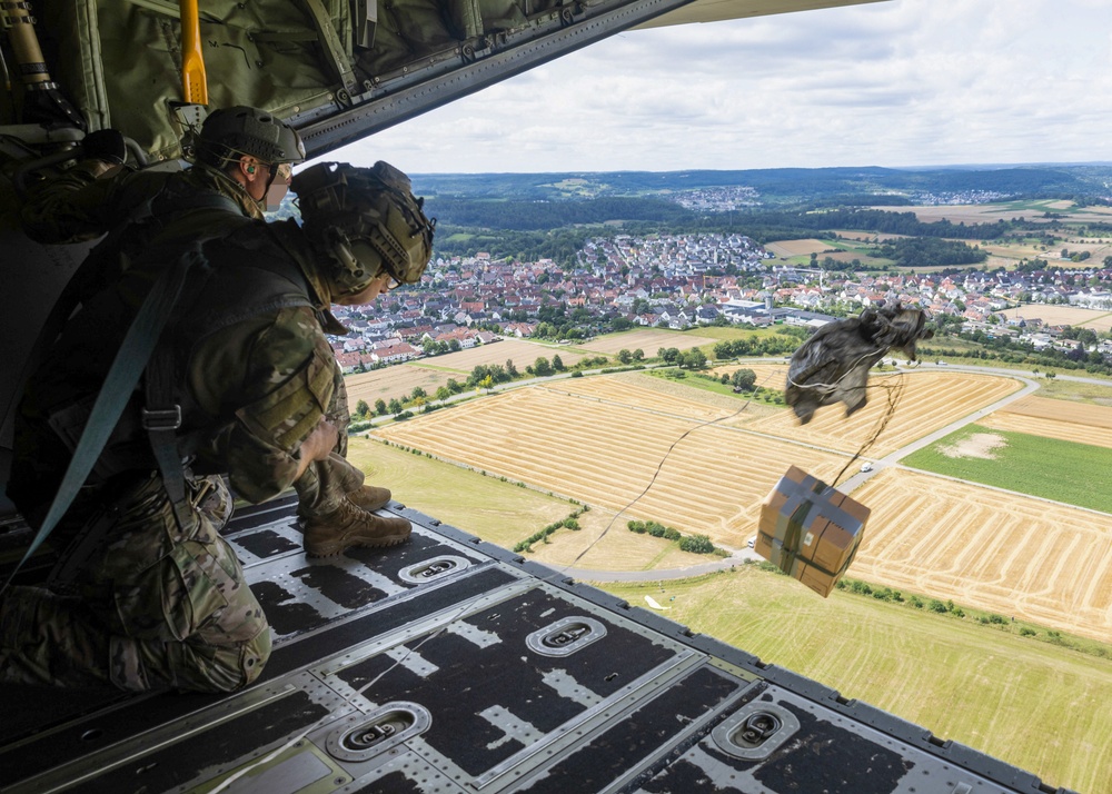 U.S. Army Green Berets perform air drop training with U.S. Air Force Airmen