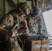 U.S. Army Green Berets perform air drop training with U.S. Air Force Airmen