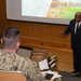Retired Rear Adm. Sinclair Harris encourages NPS students, faculty and staff to innovate and grow to meet climbing energy demands