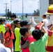 Service members from Camp Schwab host a display for local child-care center
