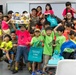 Service members from Camp Schwab host a display for local child-care center