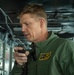 Rear Adm. Michael Wosje addresses the crew of USS Carl Vinson (CVN 70)
