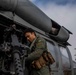 Sailors assigned to (HSC) 4 prepare for flight in an MH-60S Sea Hawk