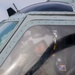 Sailors assigned to (HSC) 4 prepare for flight in an MH-60S Sea Hawk