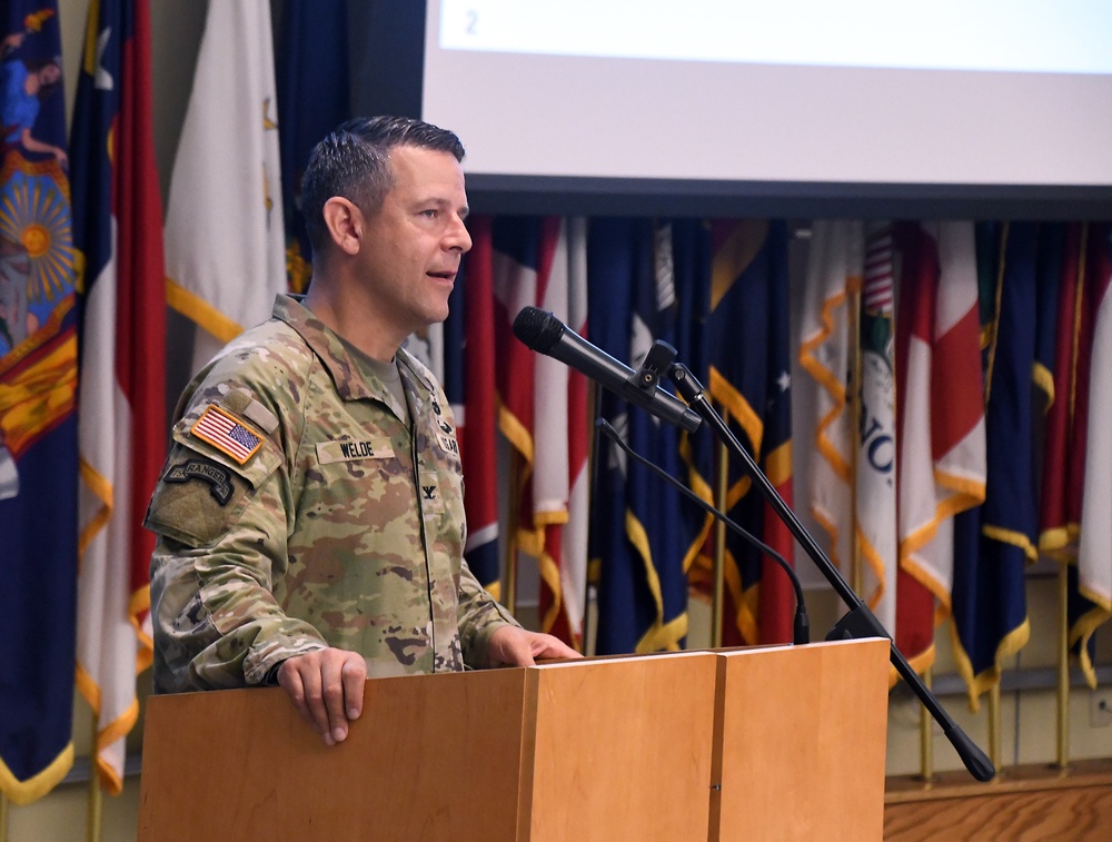 Col. Welde speaks at symposium