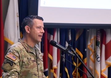 Col. Welde speaks at symposium