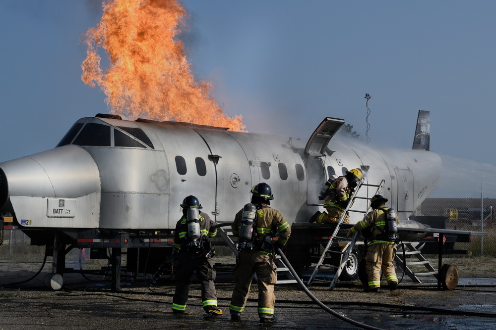 Grayling and Frederic Township fire departments trained together on an aircraft fire simulator