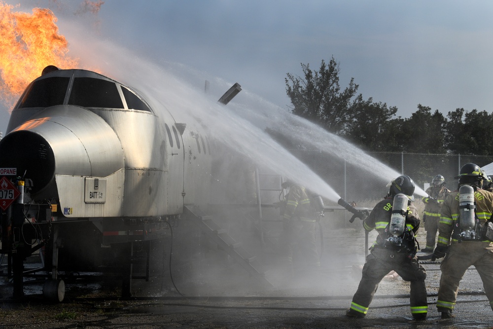 Grayling and Frederic Township fire departments trained together on an aircraft fire simulator