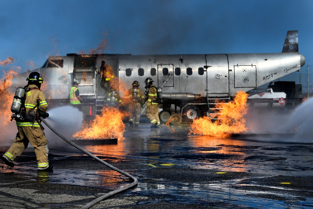 Grayling and Frederic Township fire departments trained together on an aircraft fire simulator