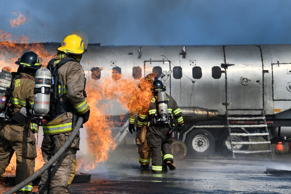 Grayling and Frederic Township fire departments trained together on an aircraft fire simulator