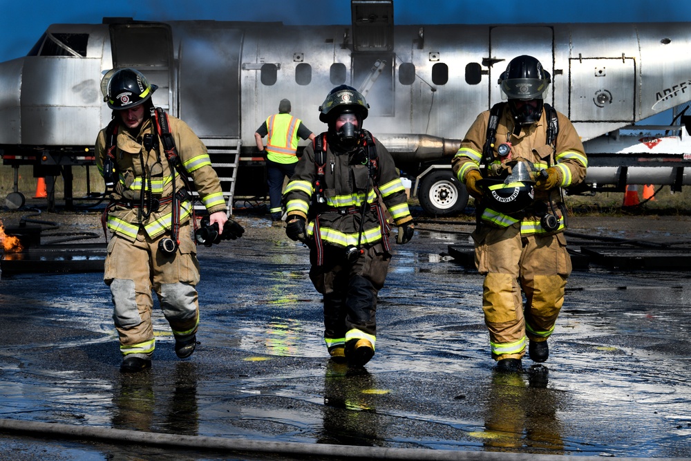 Grayling and Frederic Township fire departments trained together on an aircraft fire simulator