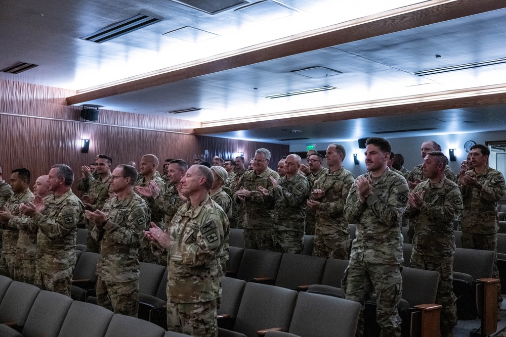 Wyoming Army Guard presents legion of merit to CW5 Doug Drost and John Fisher