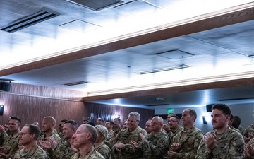 Wyoming Army Guard presents legion of merit to CW5 Doug Drost and John Fisher