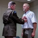 Wyoming Army Guard presents legion of merit to CW5 Doug Drost and John Fisher