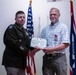 Wyoming Army Guard presents legion of merit to CW5 Doug Drost and John Fisher