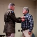 Wyoming Army Guard presents legion of merit to CW5 Doug Drost and John Fisher