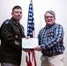 Wyoming Army Guard presents legion of merit to CW5 Doug Drost and John Fisher