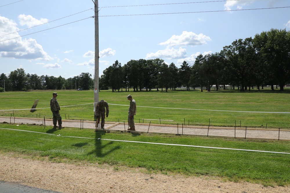 Soldiers with 612th Engineer Detachment complete Fort McCoy sidewalk troop project during CSTX 86-24-02