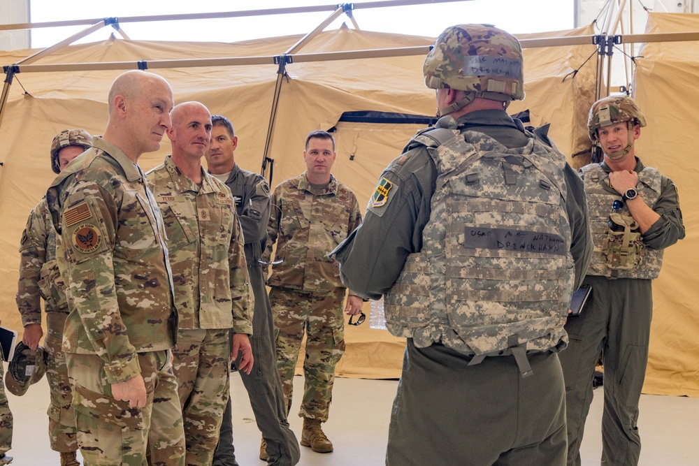 U.S. Air Force Chief of Staff Gen. David Allvin, Chief Master Sgt. of the Air Force David Flosi and U.S. Air Force Col. Keagan McLeese, 9th Reconnaissance Wing commander, speak with Airmen participating in Exercise Bamboo Eagle 24-3