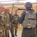 U.S. Air Force Chief of Staff Gen. David Allvin, Chief Master Sgt. of the Air Force David Flosi and U.S. Air Force Col. Keagan McLeese, 9th Reconnaissance Wing commander, speak with Airmen participating in Exercise Bamboo Eagle 24-3