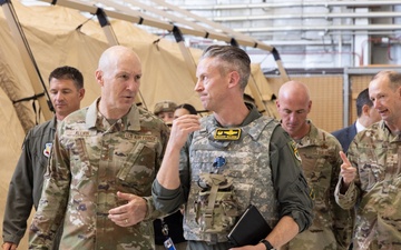 U.S. Air Force Chief of Staff Gen. David Allvin meets with U.S. Air Force Col. Keagan McLeese, 9th Reconnaissance Wing commander, during Exercise Bamboo Eagle 24-3 on Edwards Air Force Base