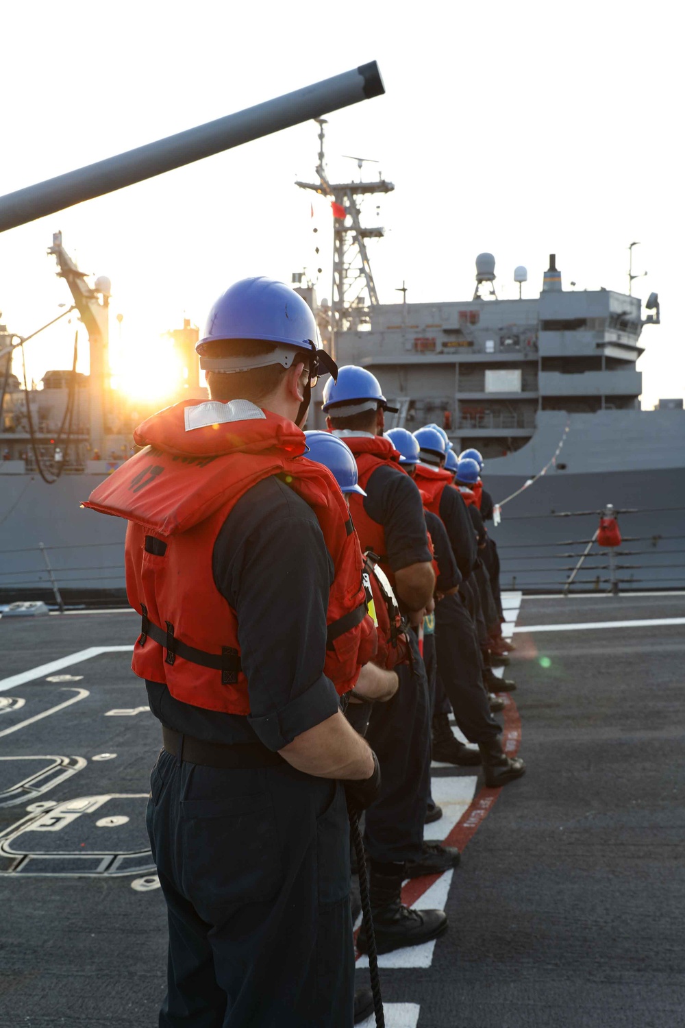 ATLANTIC OCEAN (Aug. 1, 2024) Sailors assigned to the Arleigh Burke-class guided-missile destroyer USS Jason Dunham (DDG 109), handle the phone and distance line during a replenishment-at-sea while underway for Composite Training Unit Exercise (COMPTUEX)