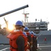 ATLANTIC OCEAN (Aug. 1, 2024) Sailors assigned to the Arleigh Burke-class guided-missile destroyer USS Jason Dunham (DDG 109), handle the phone and distance line during a replenishment-at-sea while underway for Composite Training Unit Exercise (COMPTUEX)